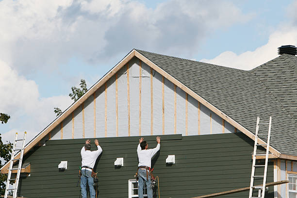 Professional Siding Installation technician working in Siloam, NC
